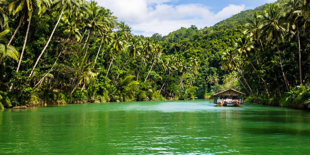 Playas de ensueño, colinas verdes, edificios históricos... este viaje a Filipinas de 10 días ofrece unas vacaciones inolvidables. 1